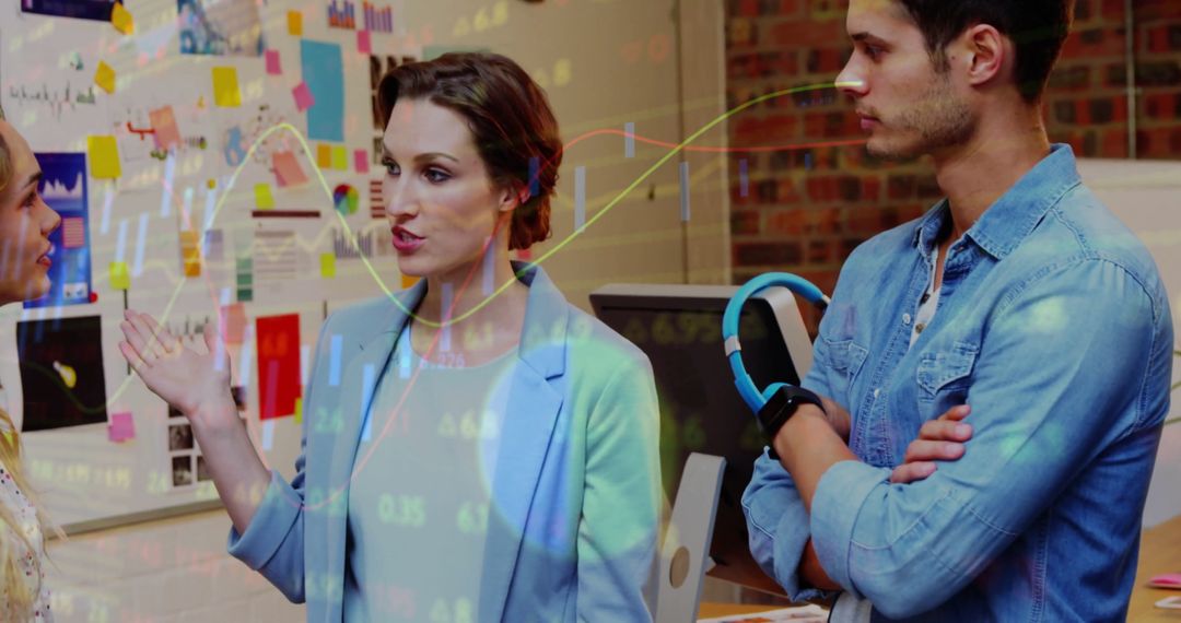 Business Team Analyzing Data with Virtual Graph Overlay in Office