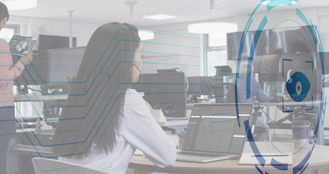 Woman Learning Coding in Modern Office with Tech Overlay