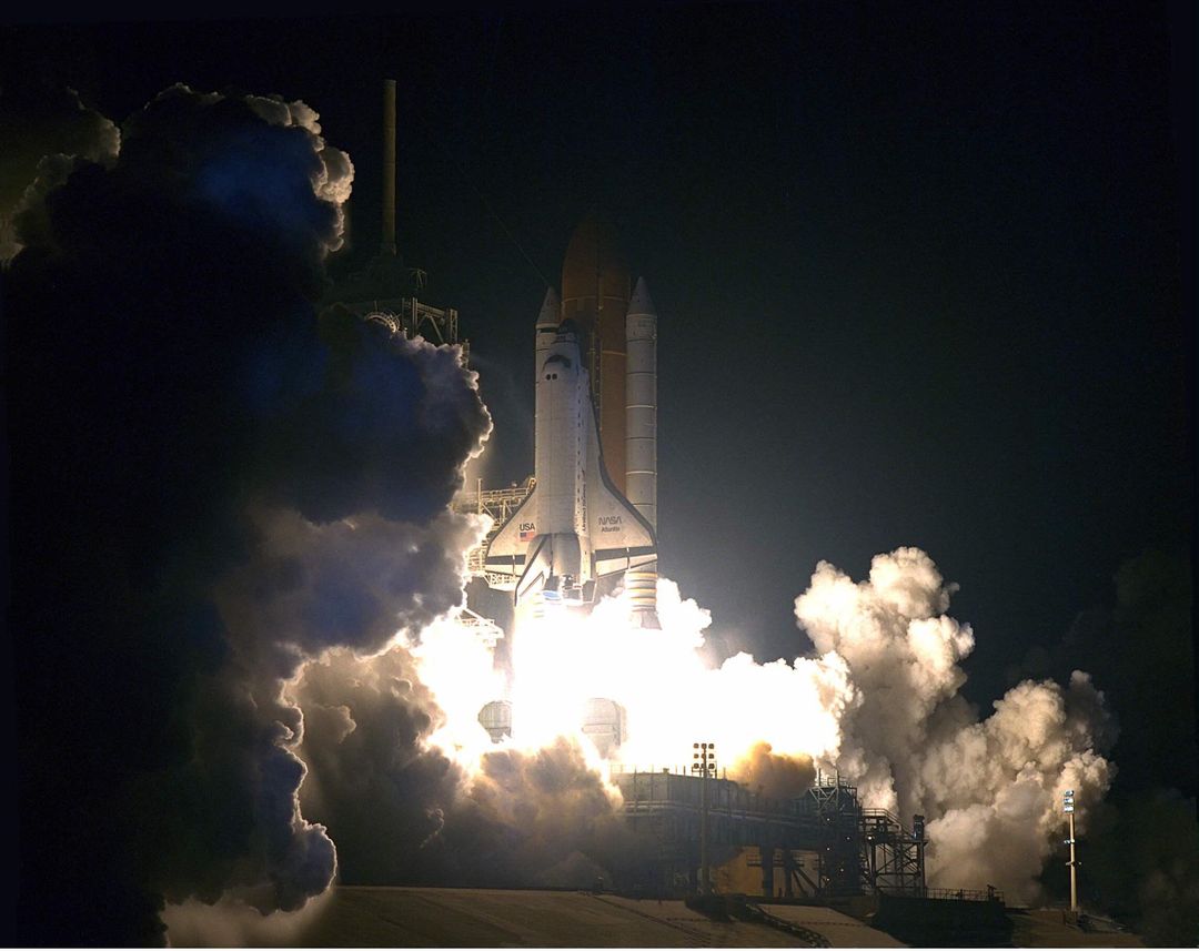 Space Shuttle Atlantis Night Launch STS-84 Mission Docking with Mir - Free Images, Stock Photos and Pictures on Pikwizard.com