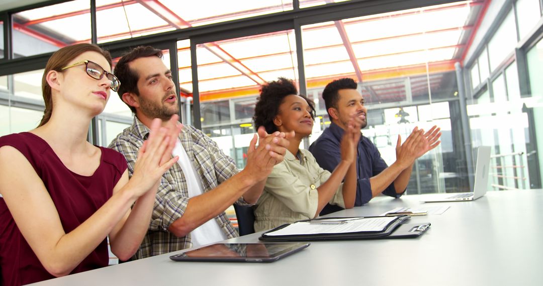 Diverse Team Applauding During Business Presentation - Free Images, Stock Photos and Pictures on Pikwizard.com