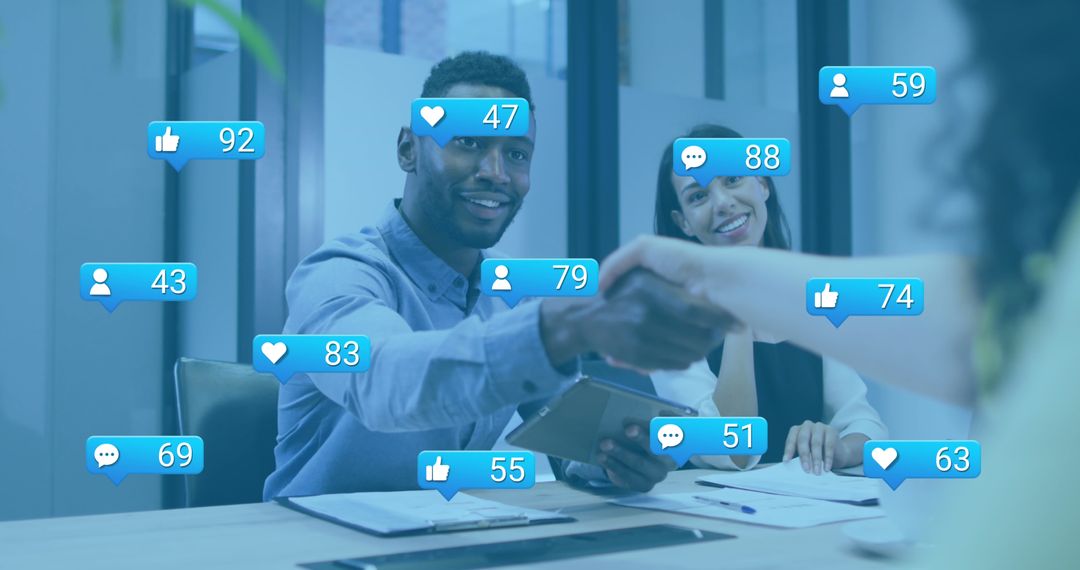 Diverse Professionals Networking with Social Media Icons in Office