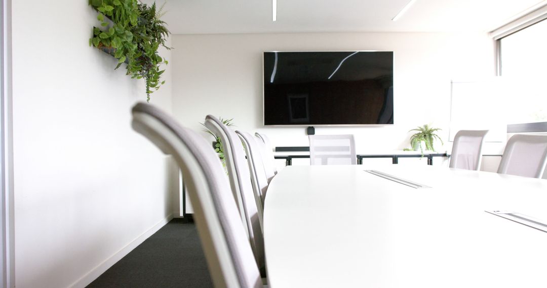 Modern Meeting Room with Large Screen and Office Chairs - Free Images, Stock Photos and Pictures on Pikwizard.com