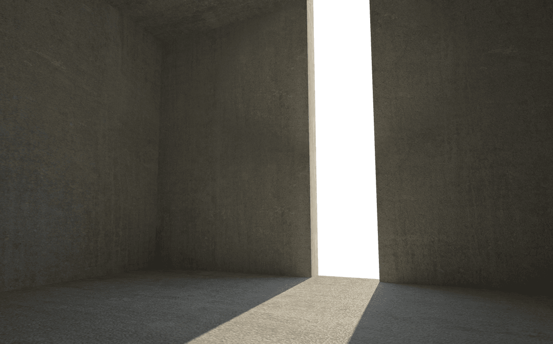 Sunlight Streaming into Shadowy Concrete Interior with Open Gap