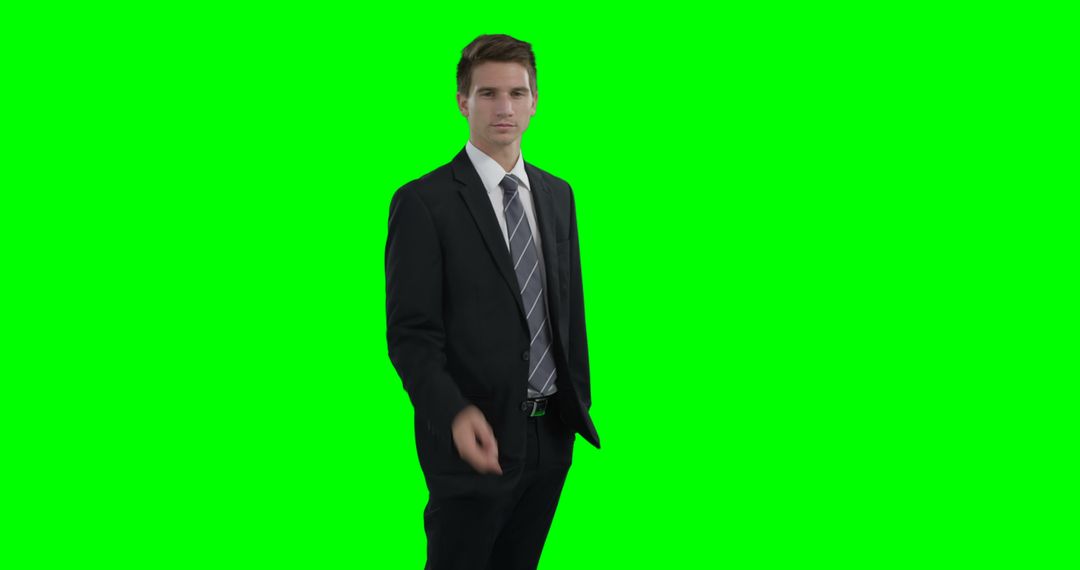 Businessman in Suit Gesturing with Green Screen Background - Free Images, Stock Photos and Pictures on Pikwizard.com