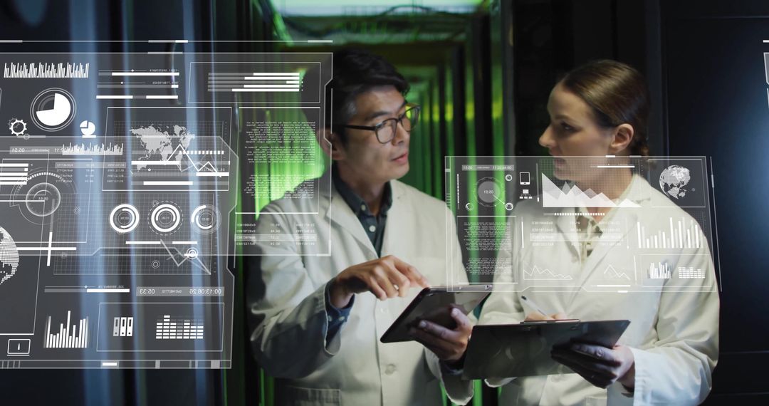 IT Technicians Analyzing Digital Data in Server Room