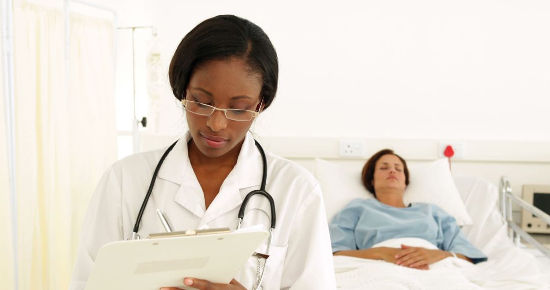 Young Female Doctor Writing Patient Notes in Hospital Room - Free Images, Stock Photos and Pictures on Pikwizard.com