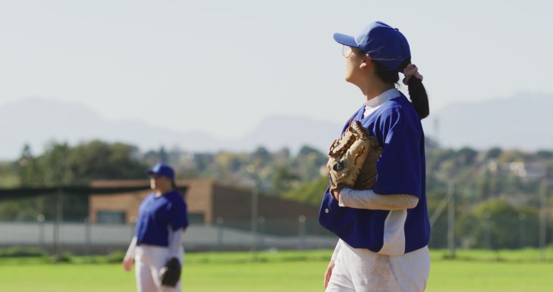 Female Baseball Player Expressing Disappointment on Field - Free Images, Stock Photos and Pictures on Pikwizard.com