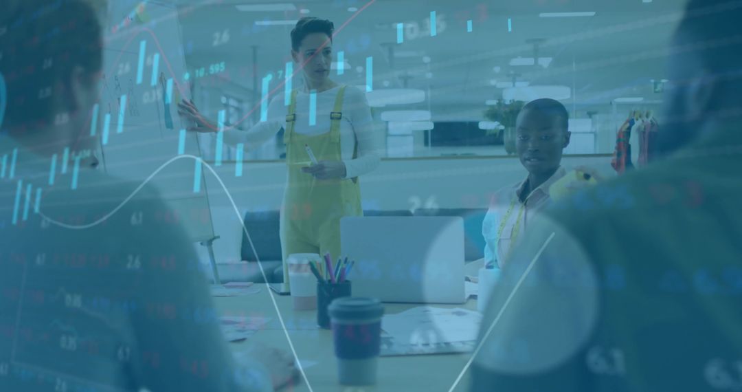 Creative Team Discussion with Dynamic Financial Graph Overlay