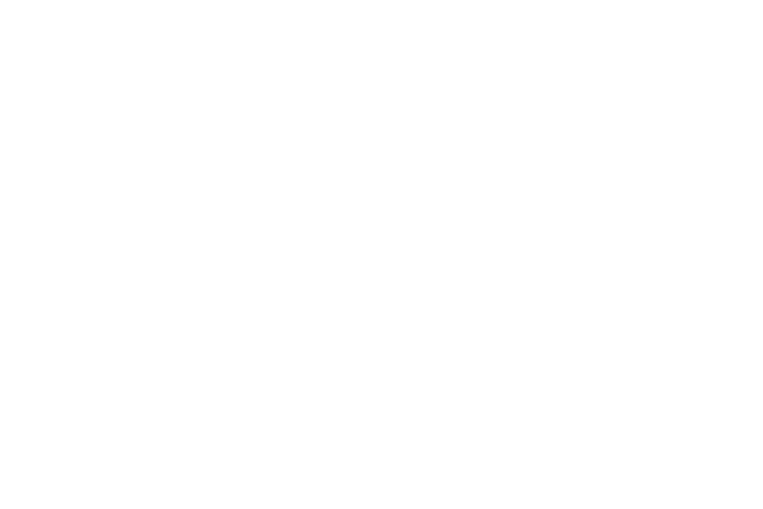 Hands Creating Heart Transparent Silhouette with Beach Background