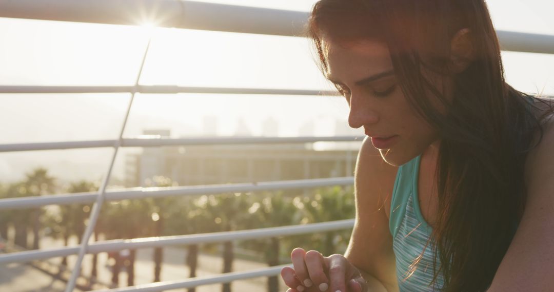 Pensive Woman in Activewear Praying at Sunset - Free Images, Stock Photos and Pictures on Pikwizard.com