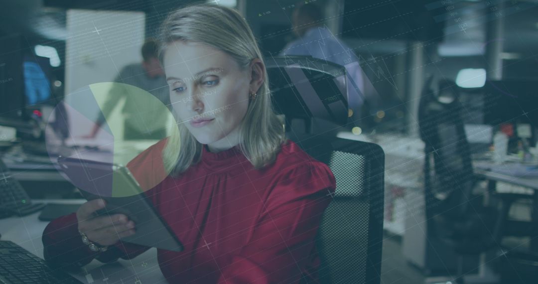 Woman Using Digital Tablet with Data Visualization at Office