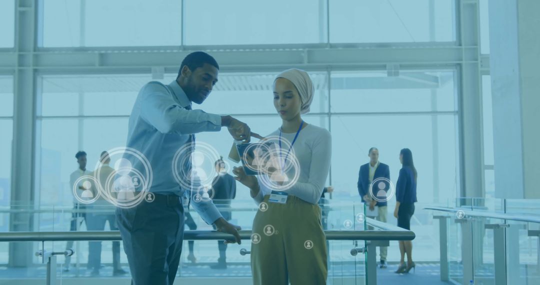 Teamwork in Modern Office with Digital Data Overlay