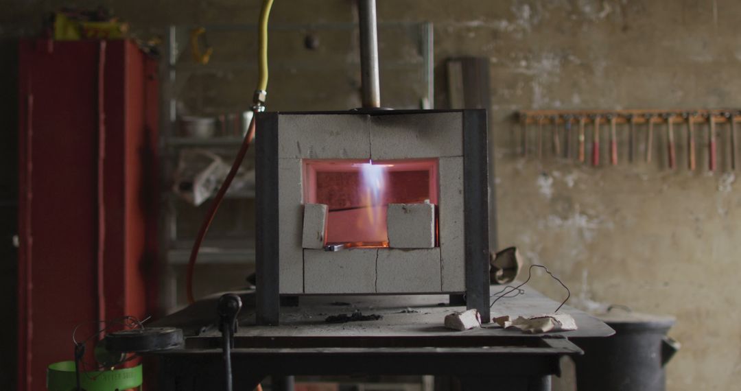 Gas Furnace with Bright Flame in Blacksmith Workshop - Free Images, Stock Photos and Pictures on Pikwizard.com