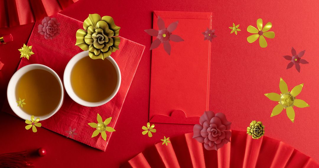 Chinese New Year Celebration with Tea and Festive Decor on Red