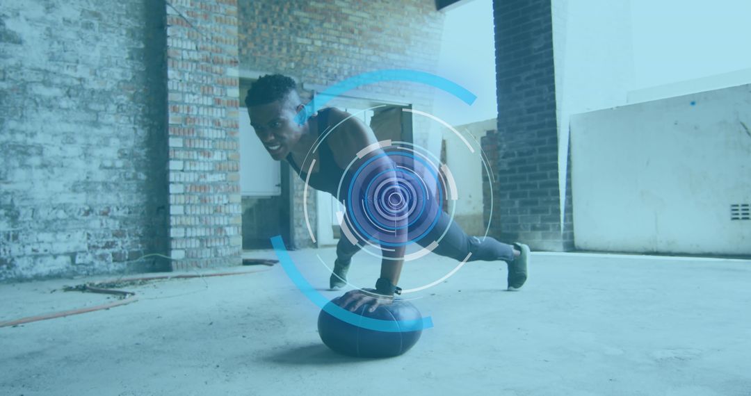 Man Exercising with Medicine Ball Enhanced by Digital Interface