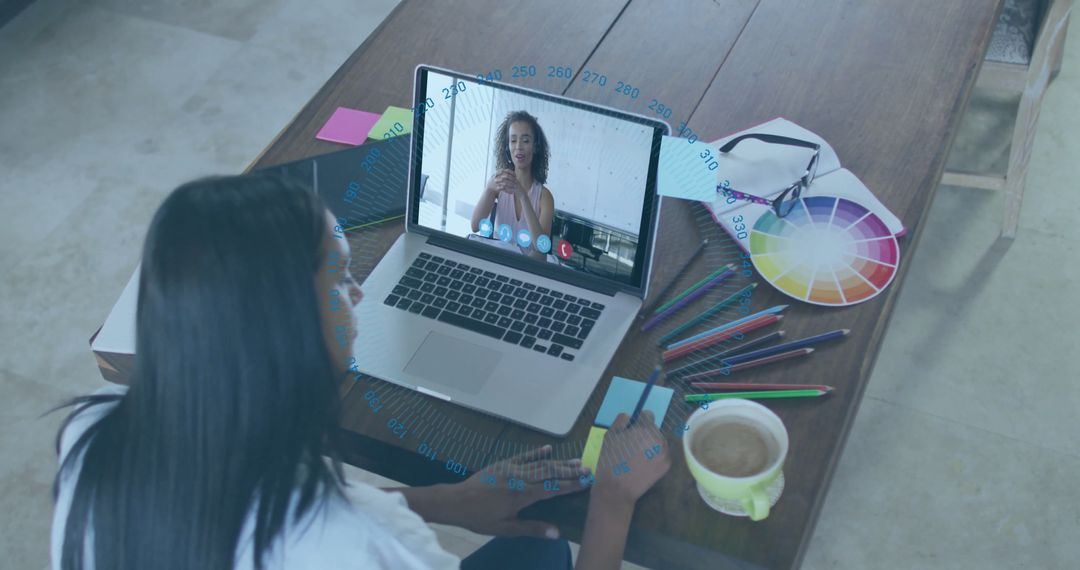 Designer Collaborating in Virtual Meeting from Home Studio