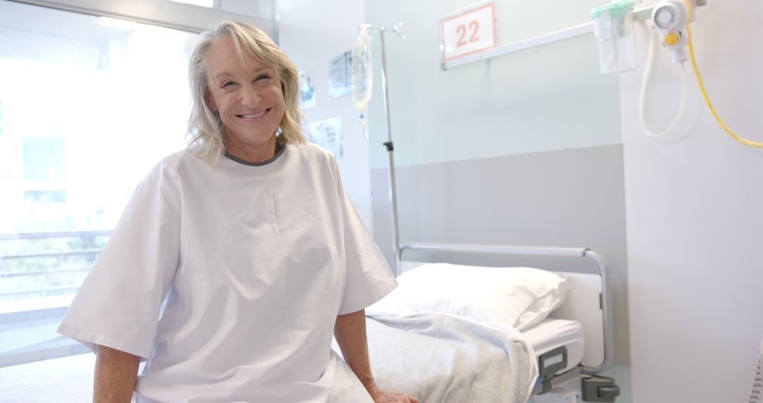 Senior Woman Smiling in Hospital Room - Free Images, Stock Photos and Pictures on Pikwizard.com