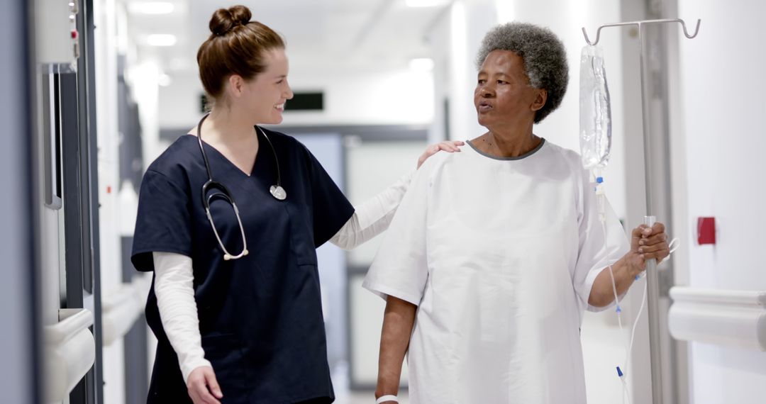 Nurse Assisting Elderly Patient at Hospital - Free Images, Stock Photos and Pictures on Pikwizard.com