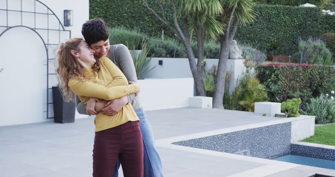 Joyful Lesbian Couple Dancing Outside Modern Home - Free Images, Stock Photos and Pictures on Pikwizard.com