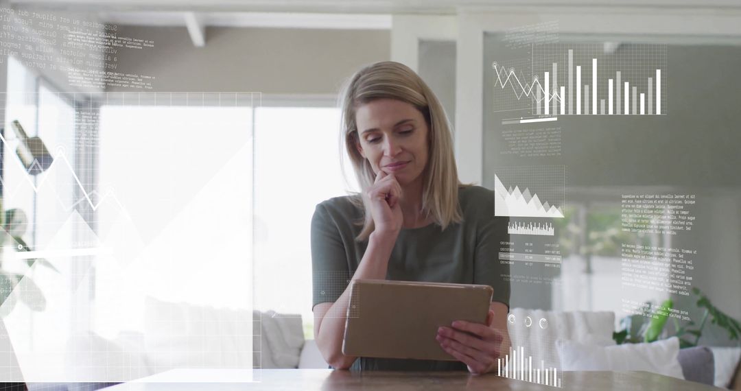 Woman Analyzing Financial Data on Digital Tablet with Graphs