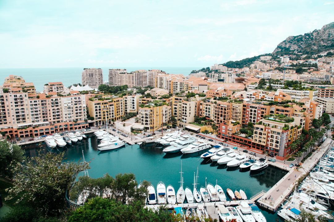 Aerial View of Luxurious Marina and Waterfront Apartments in Mediterranean City - Free Images, Stock Photos and Pictures on Pikwizard.com