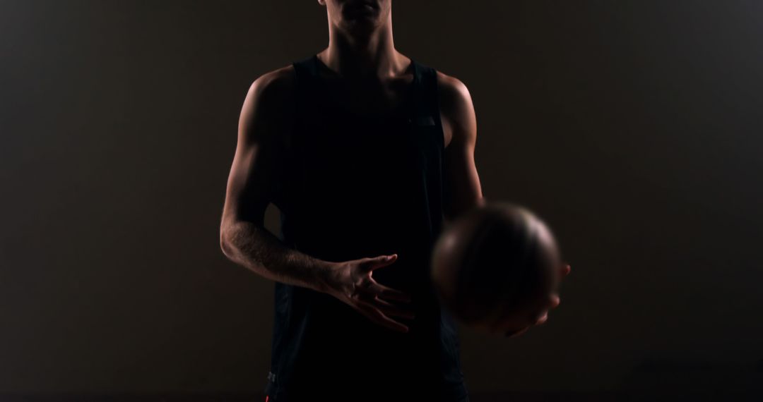 Athlete Focused on Basketball Practice in Gym
