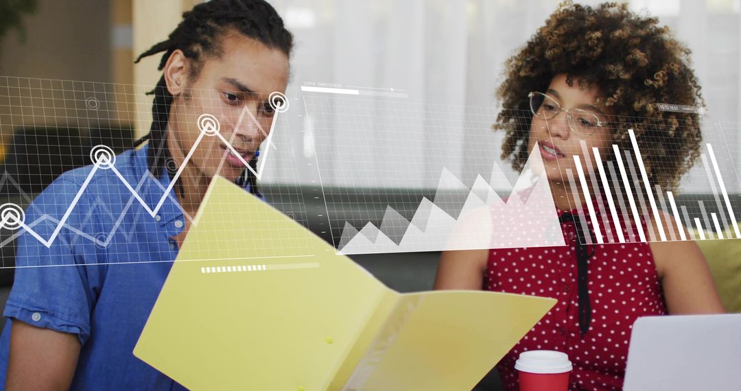 Professionals Analyzing Data with Chart Overlays in Modern Office