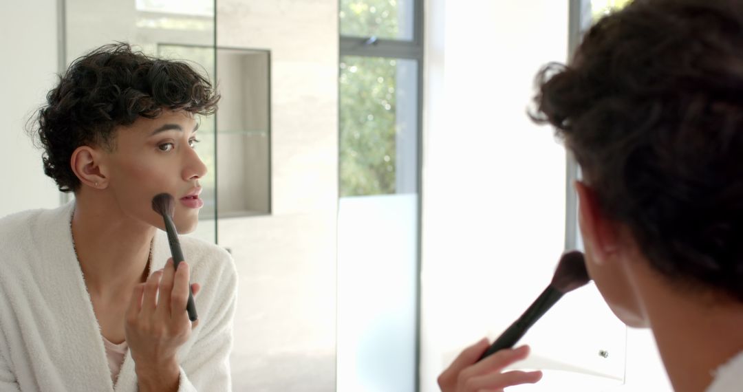 Man Practicing Makeup Routine in Modern Bathroom Mirror