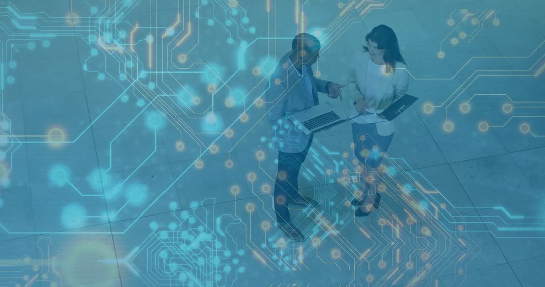 Business Colleagues Analyzing Digital Information with Circuit Overlay