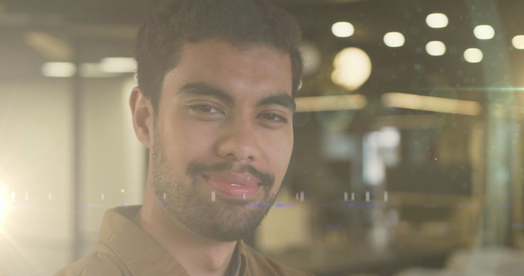 Smiling Biracial Businessman with Digital Light Effects