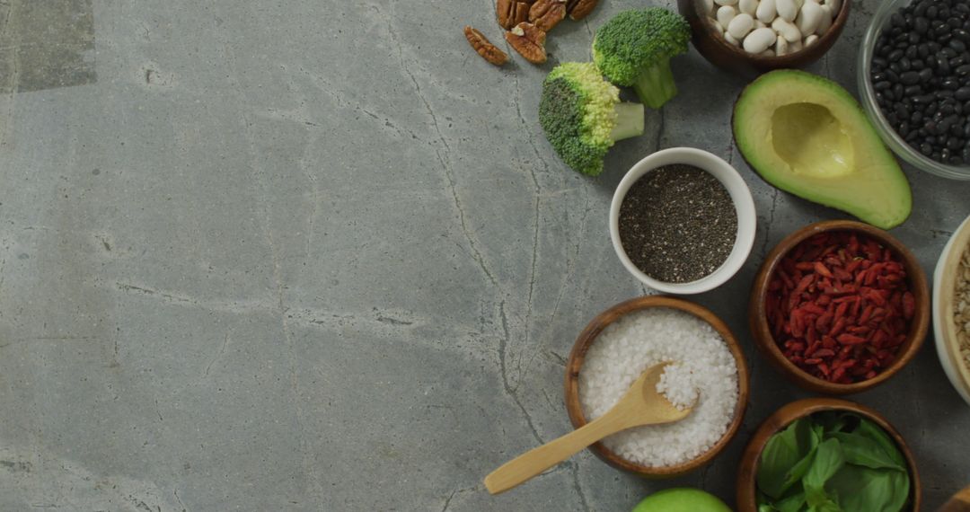 Fresh Vegan Ingredients with Empty Stone Surface for Copy Space