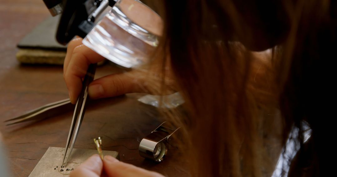 Jeweler Engaging in Detailed Crafting with Precision Tools