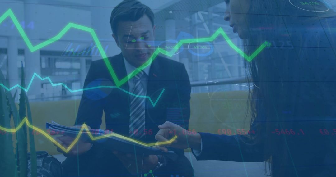 Business Colleagues Analyzing Data Trends