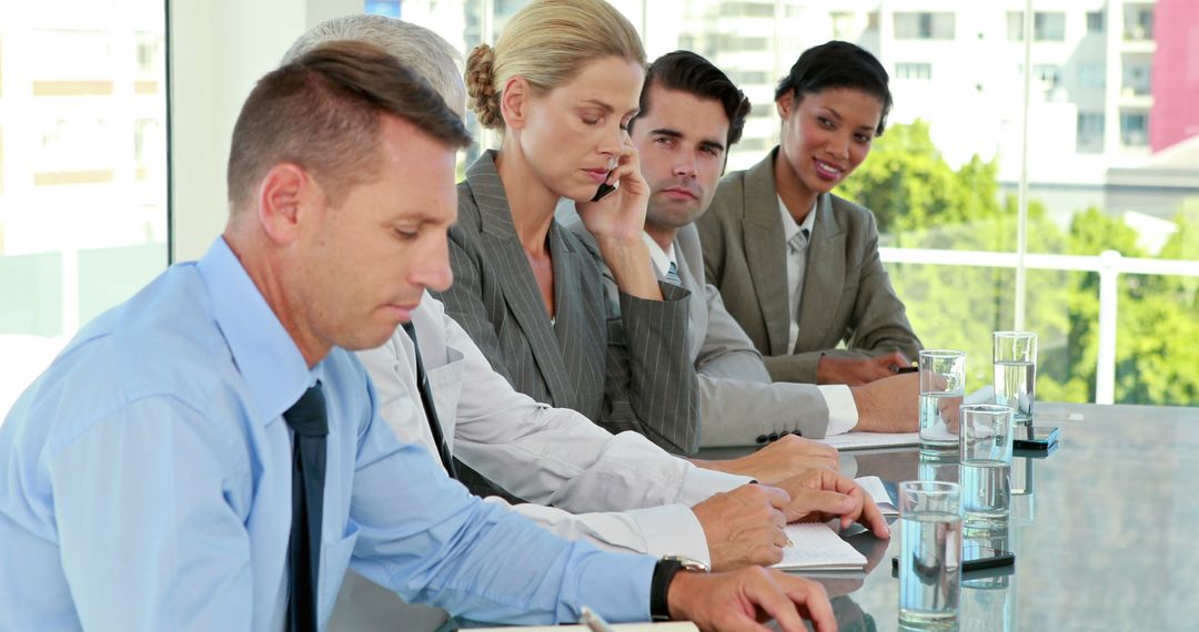 Diverse Professionals Engaged in a Business Meeting