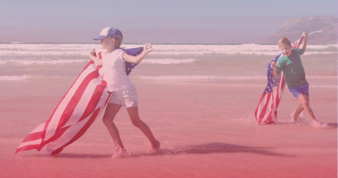 Siblings Running on Beach with American Flags