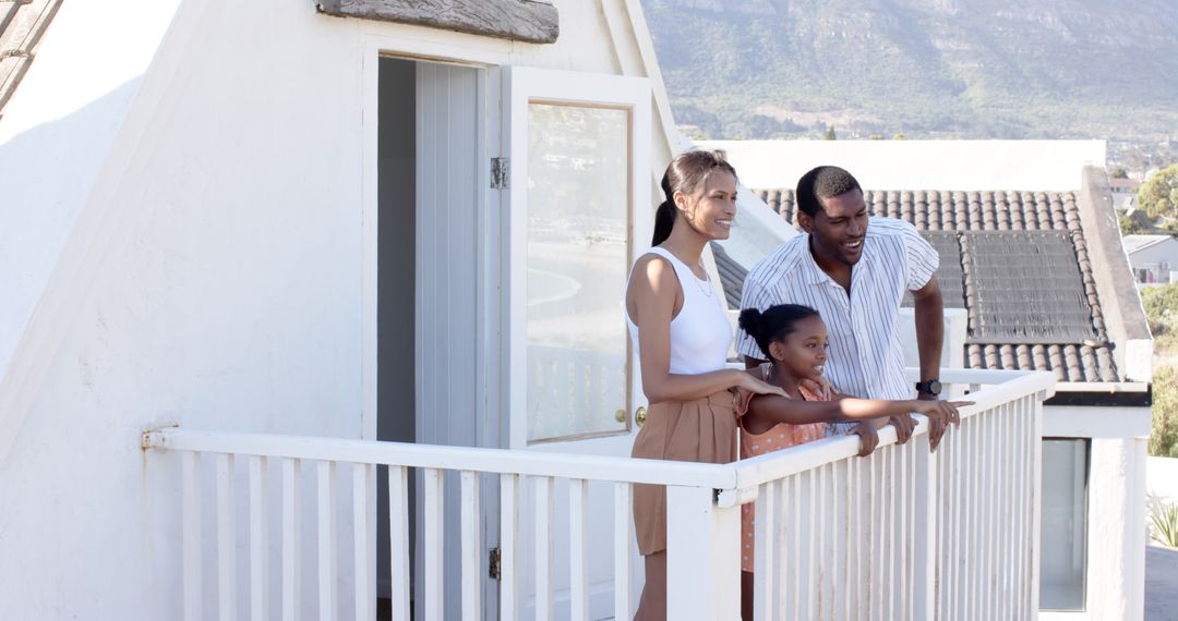 Family Enjoying Scenic View from Balcony