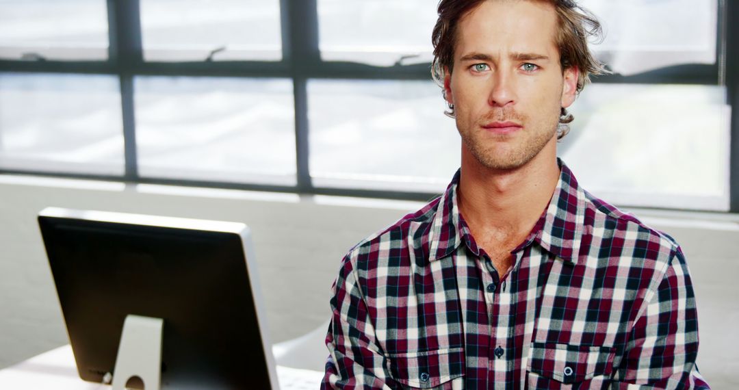 Modern Office Scene with Young Professional