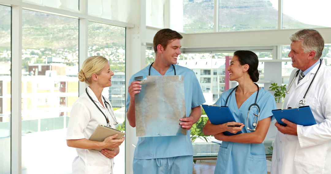 Image of medical team speaking together in medical office - Free Images, Stock Photos and Pictures on Pikwizard.com