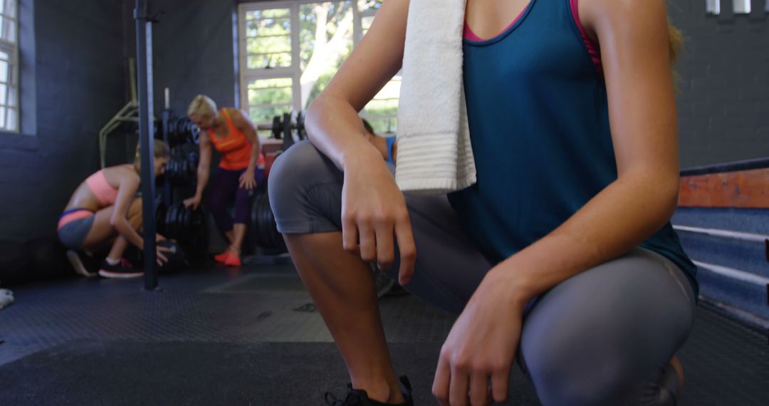 Woman Taking a Break During Workout in Gym - Free Images, Stock Photos and Pictures on Pikwizard.com