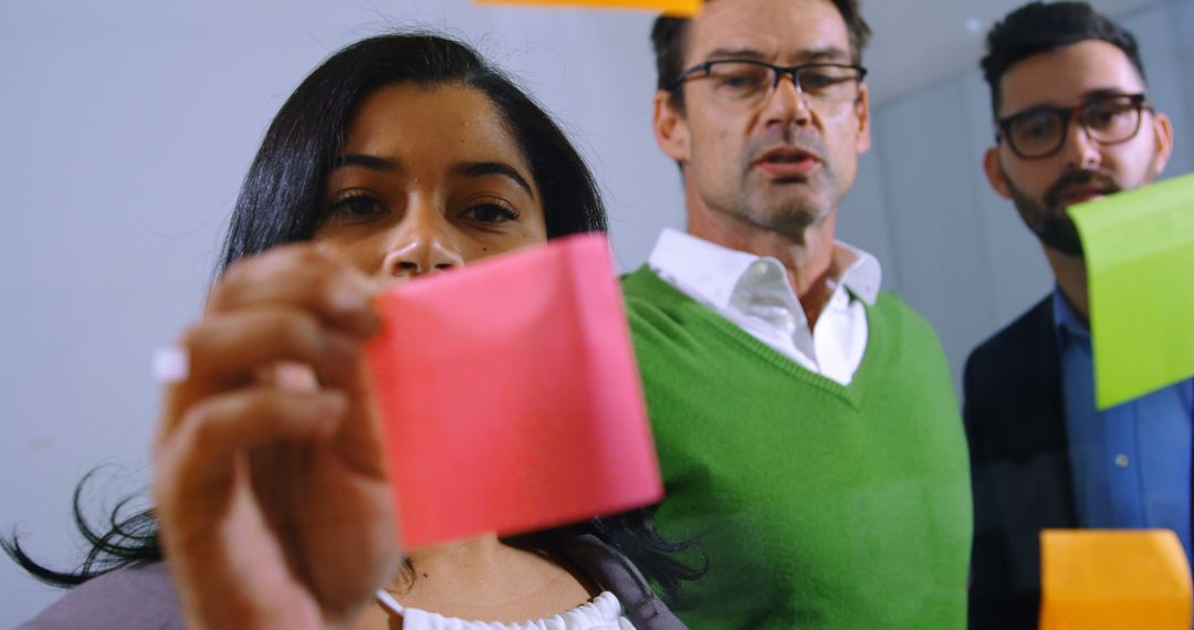 Diverse Team Brainstorming with Colorful Sticky Notes - Free Images, Stock Photos and Pictures on Pikwizard.com