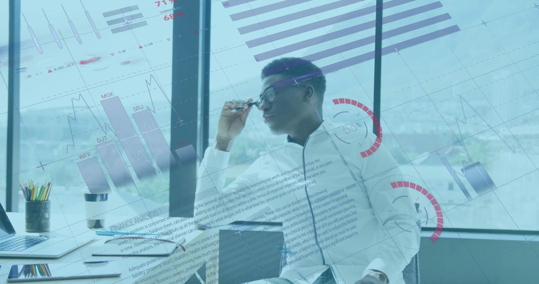 Data-driven Analysis by Businessman with Digital Overlays