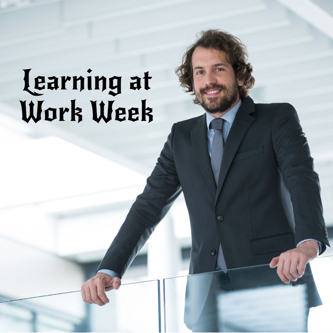 Confident Businessman Celebrating Learning at Work Week