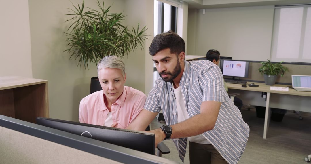 Work Collaboration in Modern Office with Technology and Greenery
