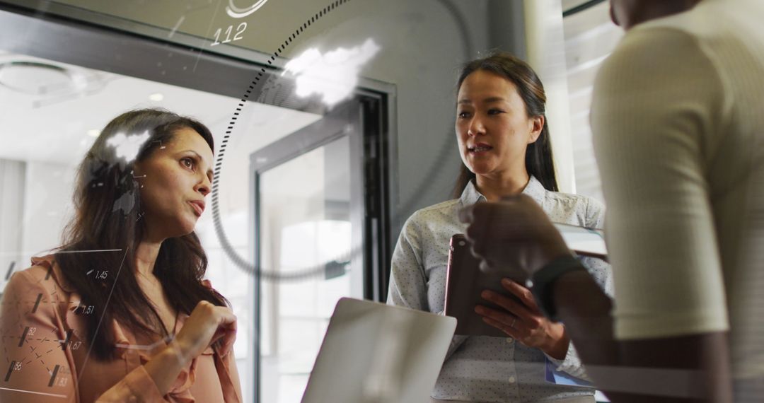 Diverse Team Collaborating on Digital Interface in Modern Office