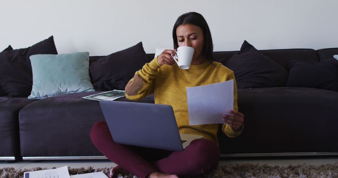 Woman Drinking Coffee While Working on Laptop at Home - Free Images, Stock Photos and Pictures on Pikwizard.com