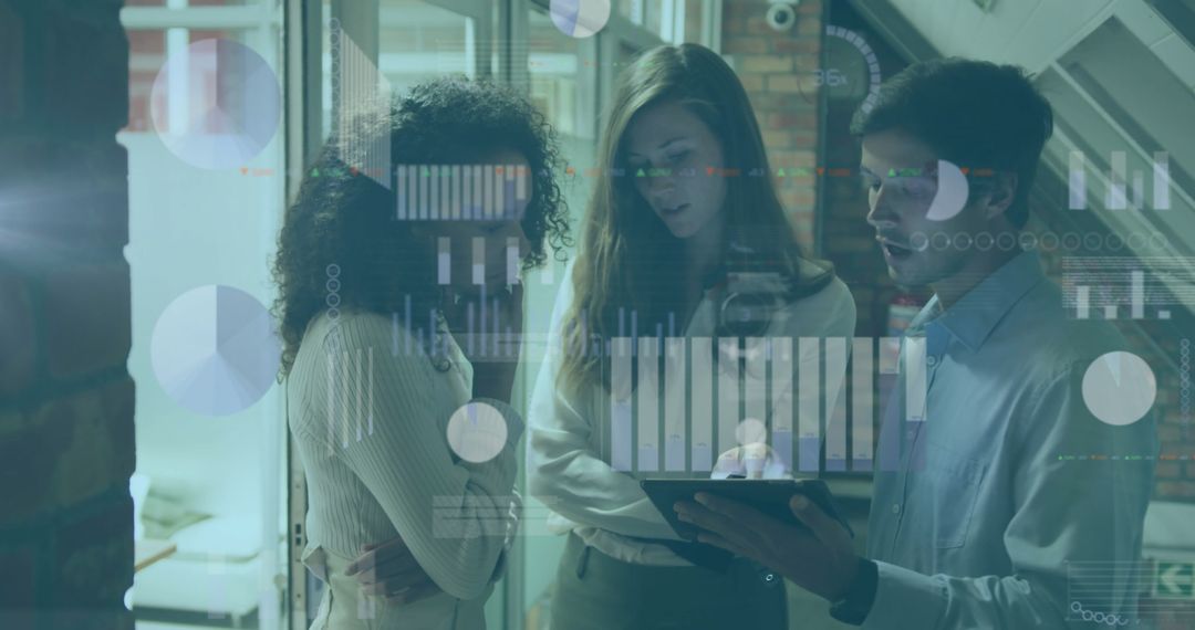 Business Professionals Analyzing Data on Tablet in Modern Office Environment