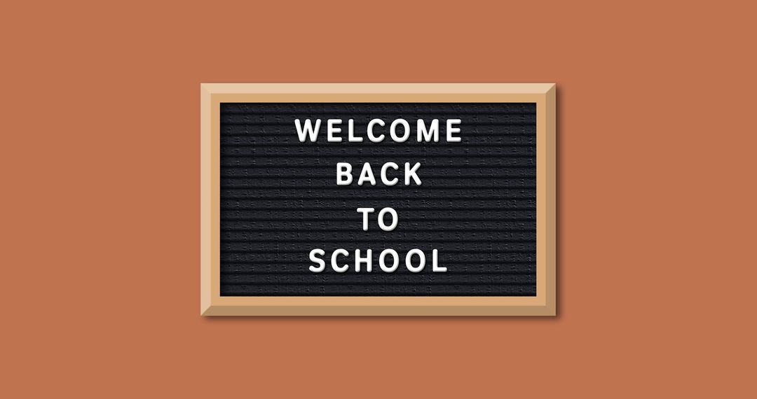 Welcome Back to School Sign on Orange Background - Free Images, Stock Photos and Pictures on Pikwizard.com