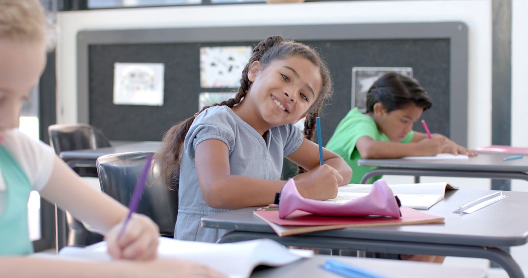 Smiling Biracial Girl Engaged in Classroom Learning Session