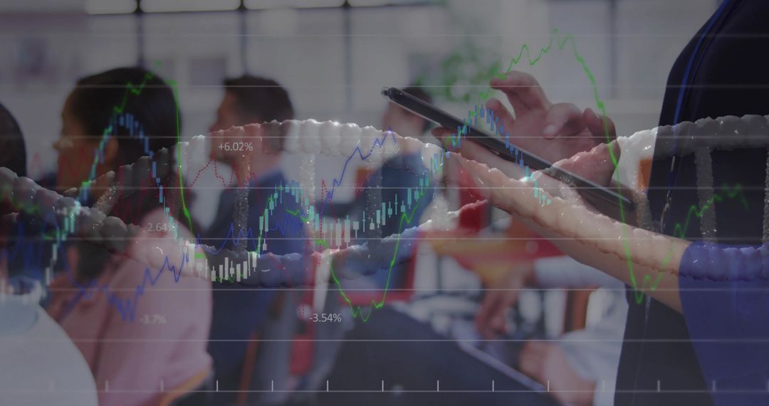 Business seminar attendee using tablet with financial charts overlay and analytics data visualizatio