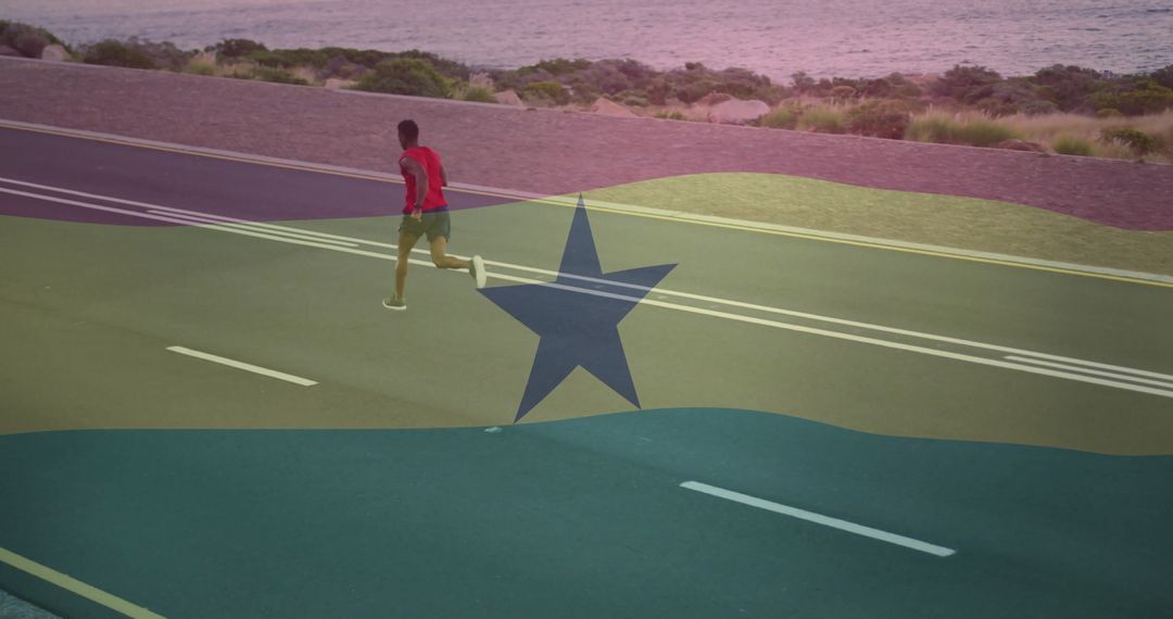 Man Running Along Coastal Road at Sunset